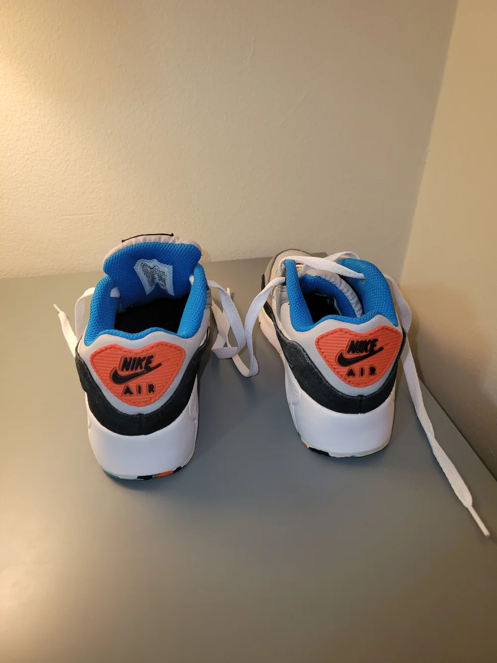 Nike AirMax90 Kids White and Gray Sneakers with Blue and Orange Accents